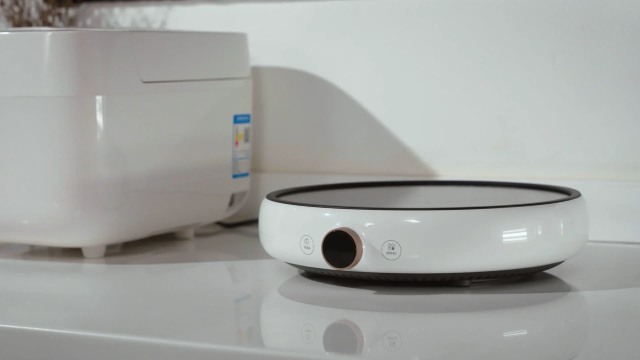 Sửa bếp từ Xiaomi có mùi khét